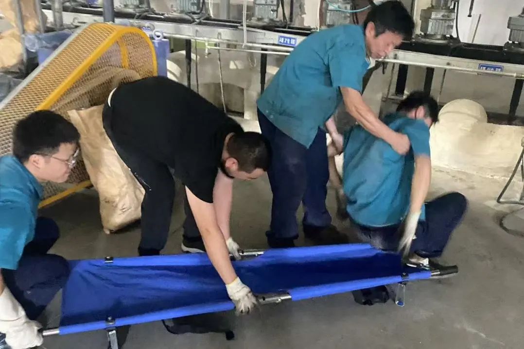 Polyester Changshu vede nouzový záchranný vrták pro úpal způsobený vysokou teplotou